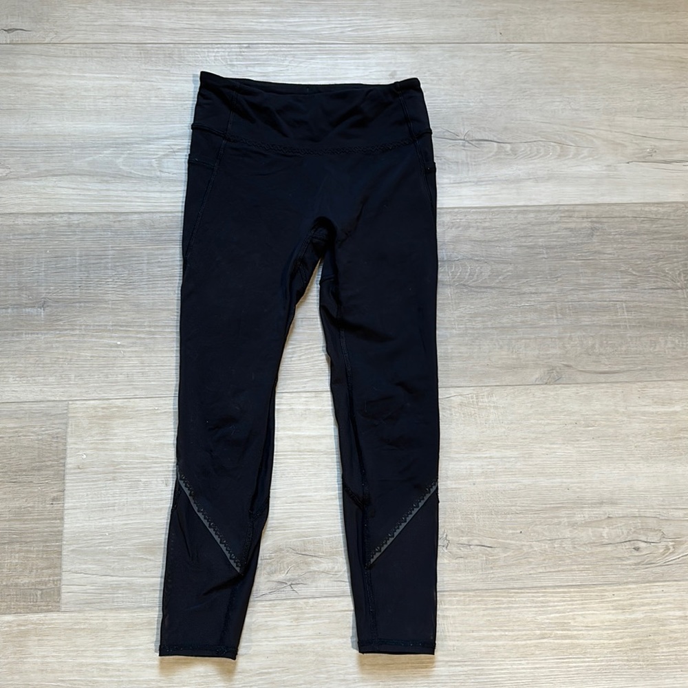 Ivivva black leggings, child size 8, in excellent condition.